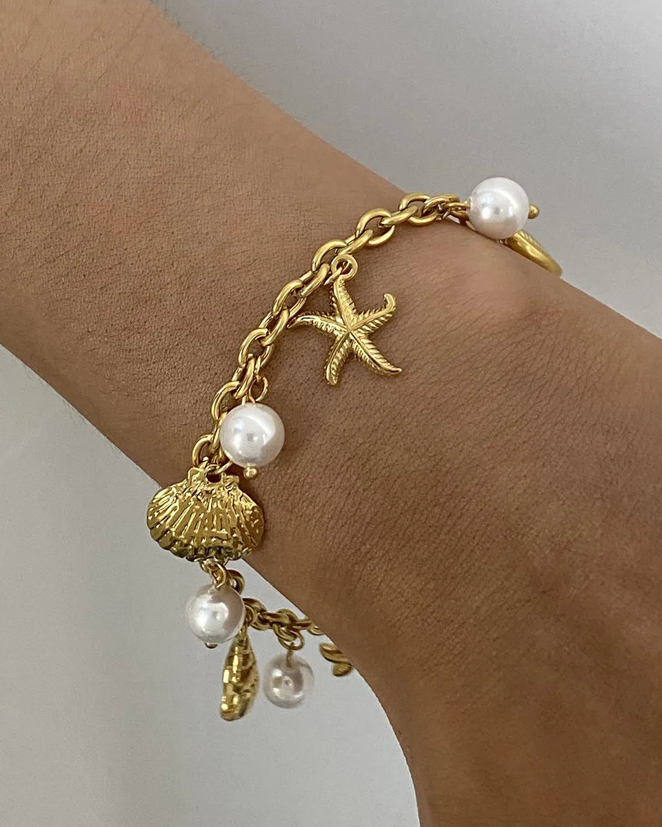 Ocean Theme Stainless Steel Chain Bracelet with Seashell and Starfish Pendants-Bracelets-Krush Kandy, Women's Online Fashion Boutique Located in Phoenix, Arizona (Scottsdale Area)